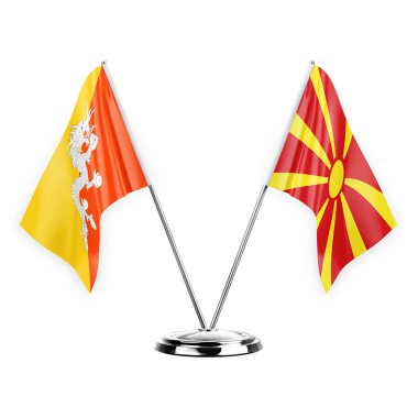 Two table flags isolated on white background 3d illustration, bhutan and north macedonia