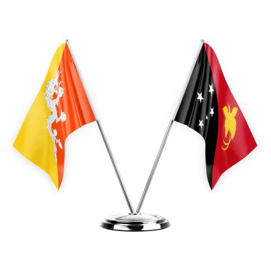 Two table flags isolated on white background 3d illustration, bhutan and papua new guinea