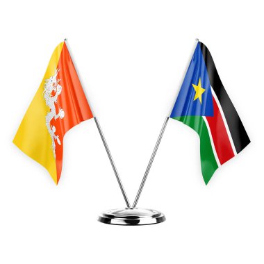 Two table flags isolated on white background 3d illustration, bhutan and south sudan