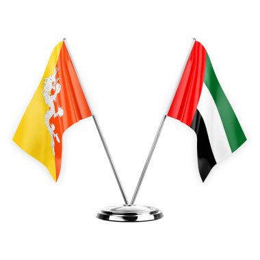 Two table flags isolated on white background 3d illustration, bhutan and united arab emirates