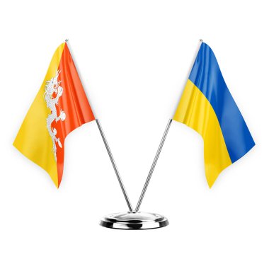 Two table flags isolated on white background 3d illustration, bhutan and ukraine