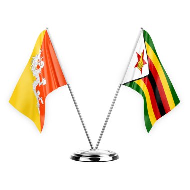Two table flags isolated on white background 3d illustration, bhutan and zimbabwe