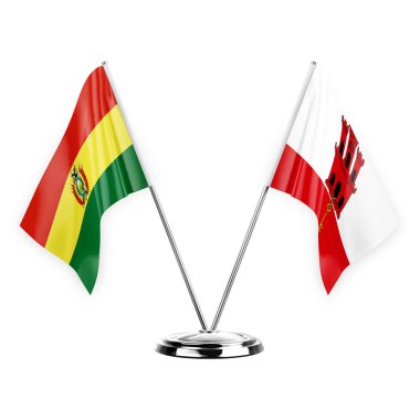 Two table flags isolated on white background 3d illustration, bolivia and gibraltar