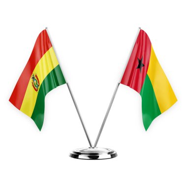 Two table flags isolated on white background 3d illustration, bolivia and guinea-bissau