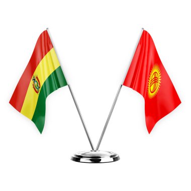 Two table flags isolated on white background 3d illustration, bolivia and kyrgyzstan