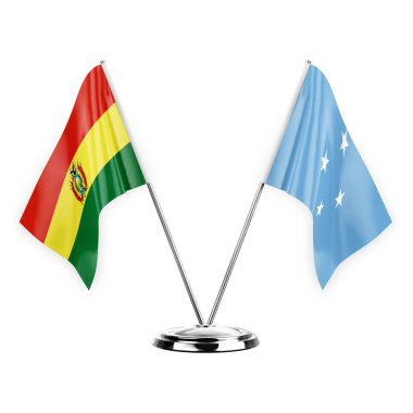 Two table flags isolated on white background 3d illustration, bolivia and micronesia