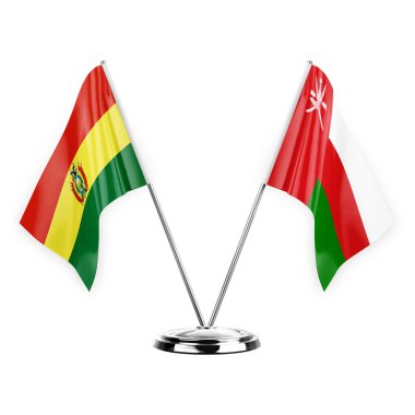Two table flags isolated on white background 3d illustration, bolivia and oman