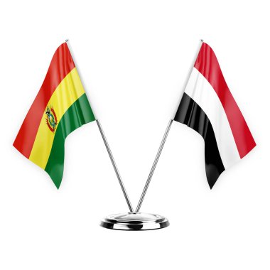 Two table flags isolated on white background 3d illustration, bolivia and yemen