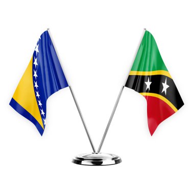 Two table flags isolated on white background 3d illustration, bosnia and saint kitts and venis