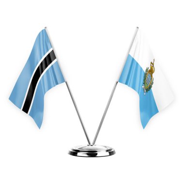 Two table flags isolated on white background 3d illustration, botswana and san marino
