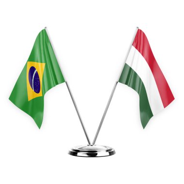 Two table flags isolated on white background 3d illustration, brazil and hungary