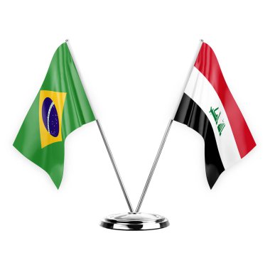 Two table flags isolated on white background 3d illustration, brazil and iraq