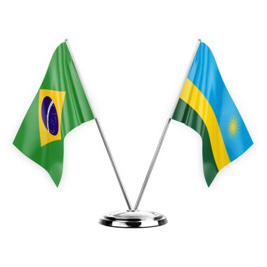 Two table flags isolated on white background 3d illustration, brazil and rwanda