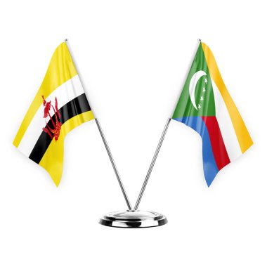Two table flags isolated on white background 3d illustration, brunei and comoros