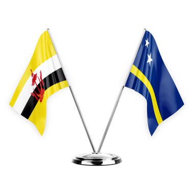 Two table flags isolated on white background 3d illustration, brunei and curacao