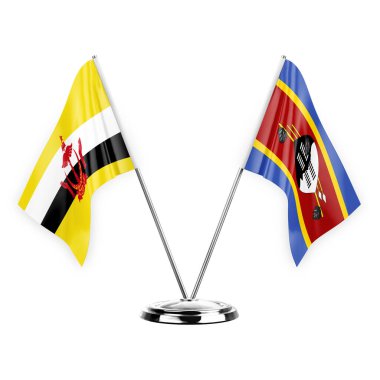 Two table flags isolated on white background 3d illustration, brunei and eswatini