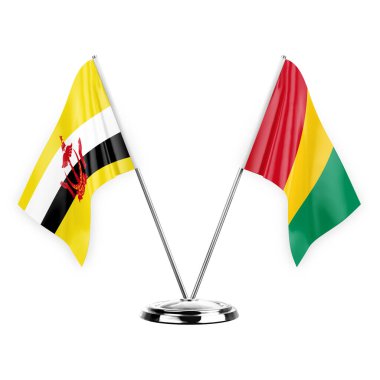 Two table flags isolated on white background 3d illustration, brunei and guinea