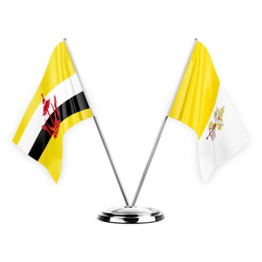 Two table flags isolated on white background 3d illustration, brunei and holy see