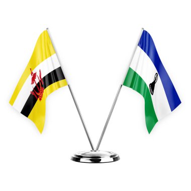 Two table flags isolated on white background 3d illustration, brunei and lesotho