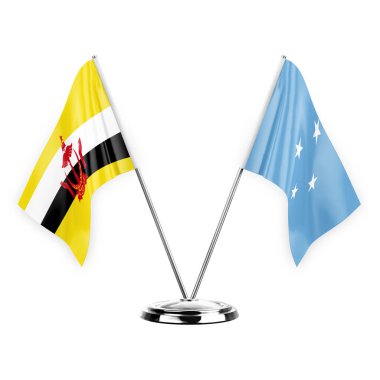Two table flags isolated on white background 3d illustration, brunei and micronesia