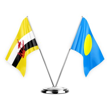 Two table flags isolated on white background 3d illustration, brunei and palau