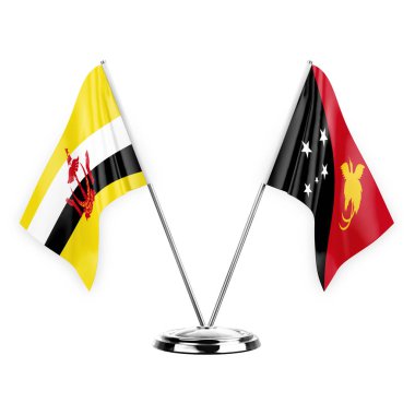 Two table flags isolated on white background 3d illustration, brunei and papua new guinea