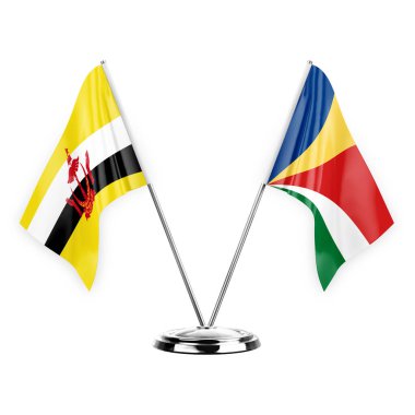 Two table flags isolated on white background 3d illustration, brunei and seychelles