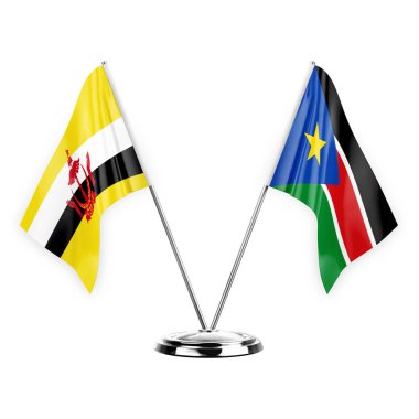 Two table flags isolated on white background 3d illustration, brunei and south sudan
