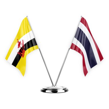 Two table flags isolated on white background 3d illustration, brunei and thailand
