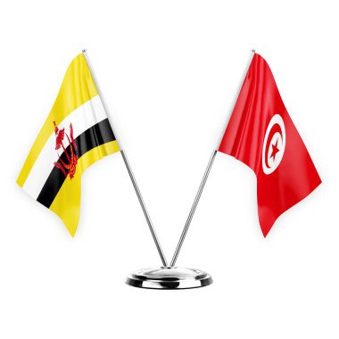 Two table flags isolated on white background 3d illustration, brunei and tunisia