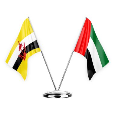 Two table flags isolated on white background 3d illustration, brunei and united arab emirates