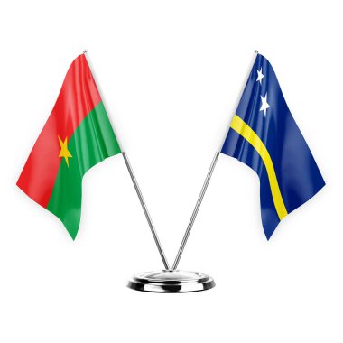 Two table flags isolated on white background 3d illustration, burkina faso and curacao