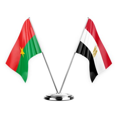Two table flags isolated on white background 3d illustration, burkina faso and egypt