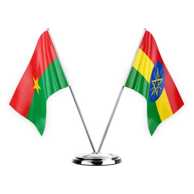 Two table flags isolated on white background 3d illustration, burkina faso and ethiopia