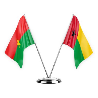 Two table flags isolated on white background 3d illustration, burkina faso and guinea-bissau