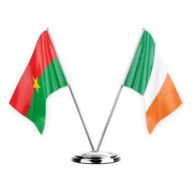 Two table flags isolated on white background 3d illustration, burkina faso and ireland