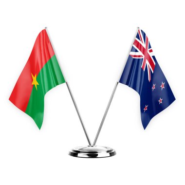 Two table flags isolated on white background 3d illustration, burkina faso and new zealand