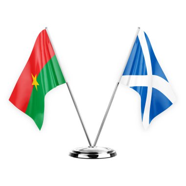 Two table flags isolated on white background 3d illustration, burkina faso and scotland