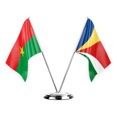 Two table flags isolated on white background 3d illustration, burkina faso and seychelles