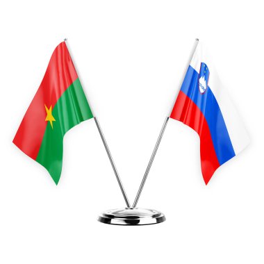 Two table flags isolated on white background 3d illustration, burkina faso and slovenia