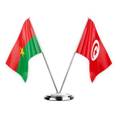 Two table flags isolated on white background 3d illustration, burkina faso and tunisia