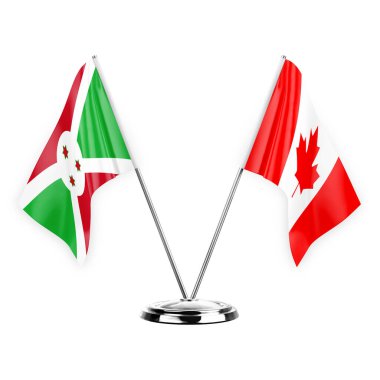 Two table flags isolated on white background 3d illustration, burundi and canada