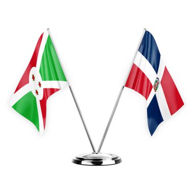 Two table flags isolated on white background 3d illustration, burundi and dominican republic