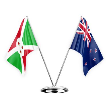 Two table flags isolated on white background 3d illustration, burundi and new zealand