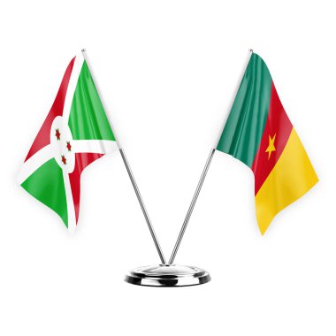 Two table flags isolated on white background 3d illustration, burundi and cameroon