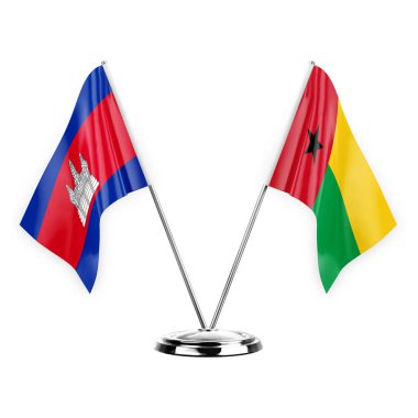 Two table flags isolated on white background 3d illustration, cambodia and guinea-bissau