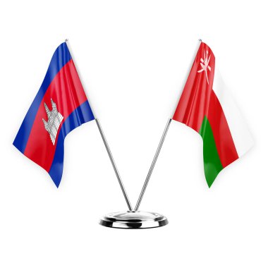Two table flags isolated on white background 3d illustration, cambodia and oman