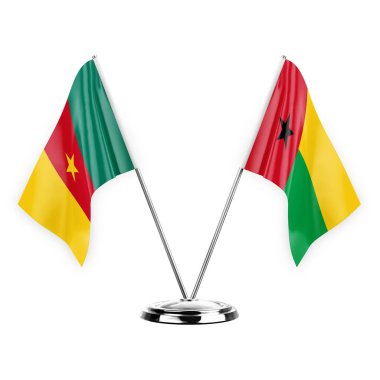 Two table flags isolated on white background 3d illustration, cameroon and guinea-bissau