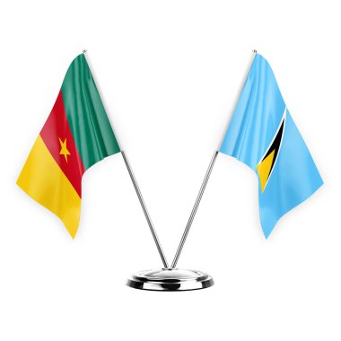 Two table flags isolated on white background 3d illustration, cameroon and saint lucia