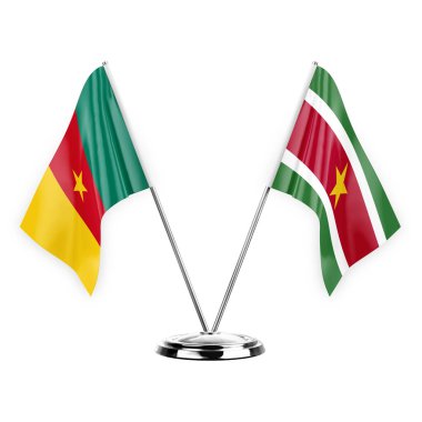 Two table flags isolated on white background 3d illustration, cameroon and suriname